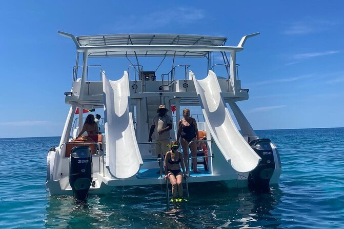 Private Half Day with Waterslide Boat - A quiet beach stop