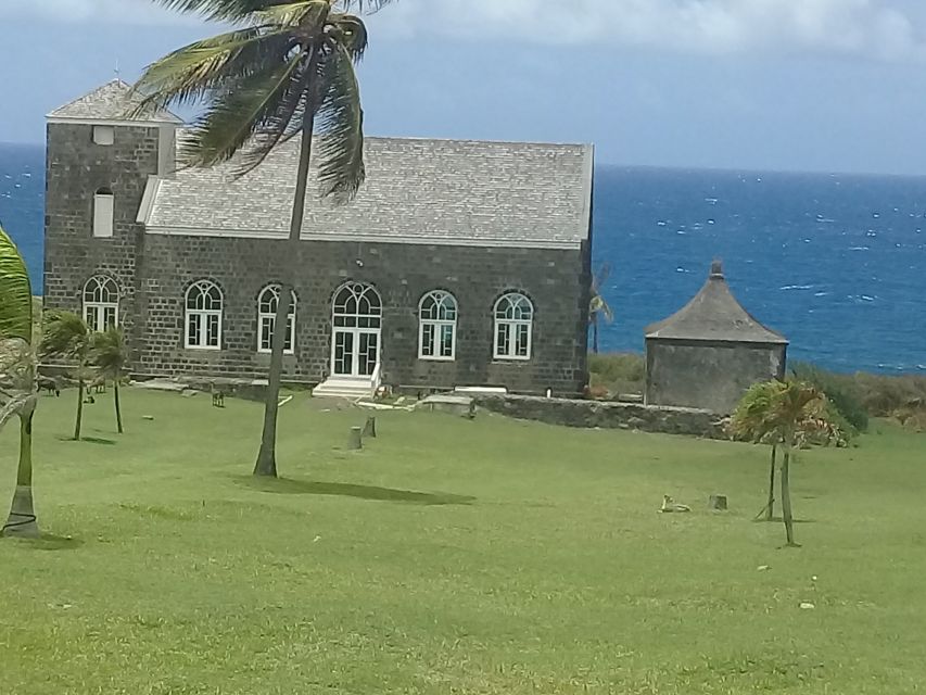 St. Kitts Island Half-Day Bus Tour - Black Rocks at the meeting point of two seas